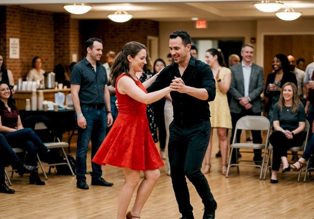 Salsa dancers energize mid-sized event hall