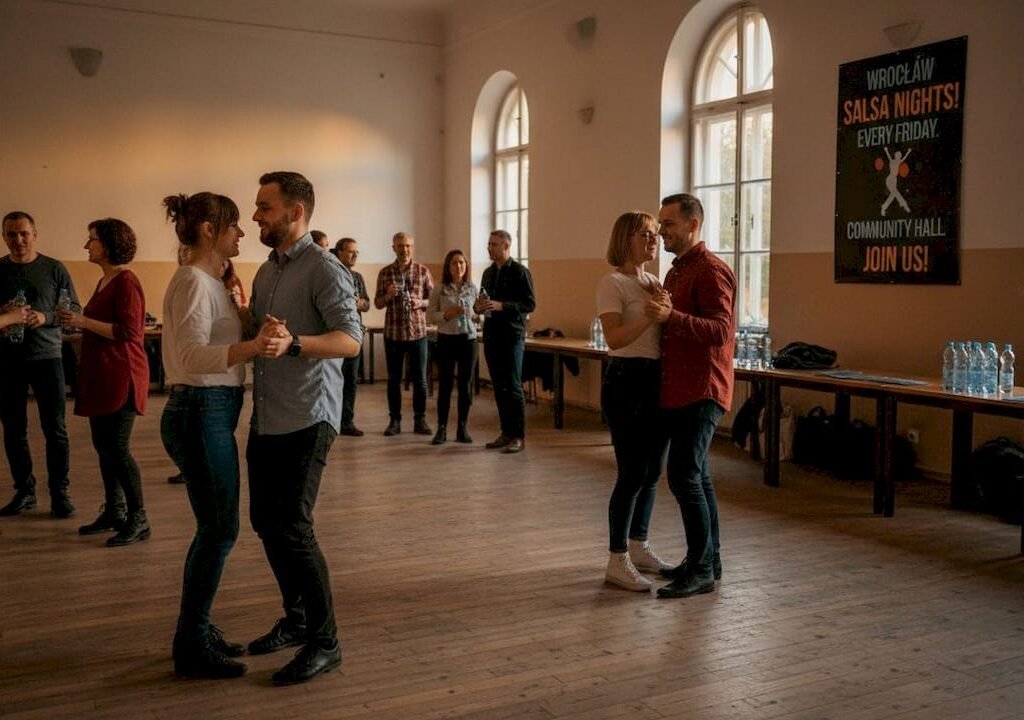 Guests dancing and socializing at salsa event