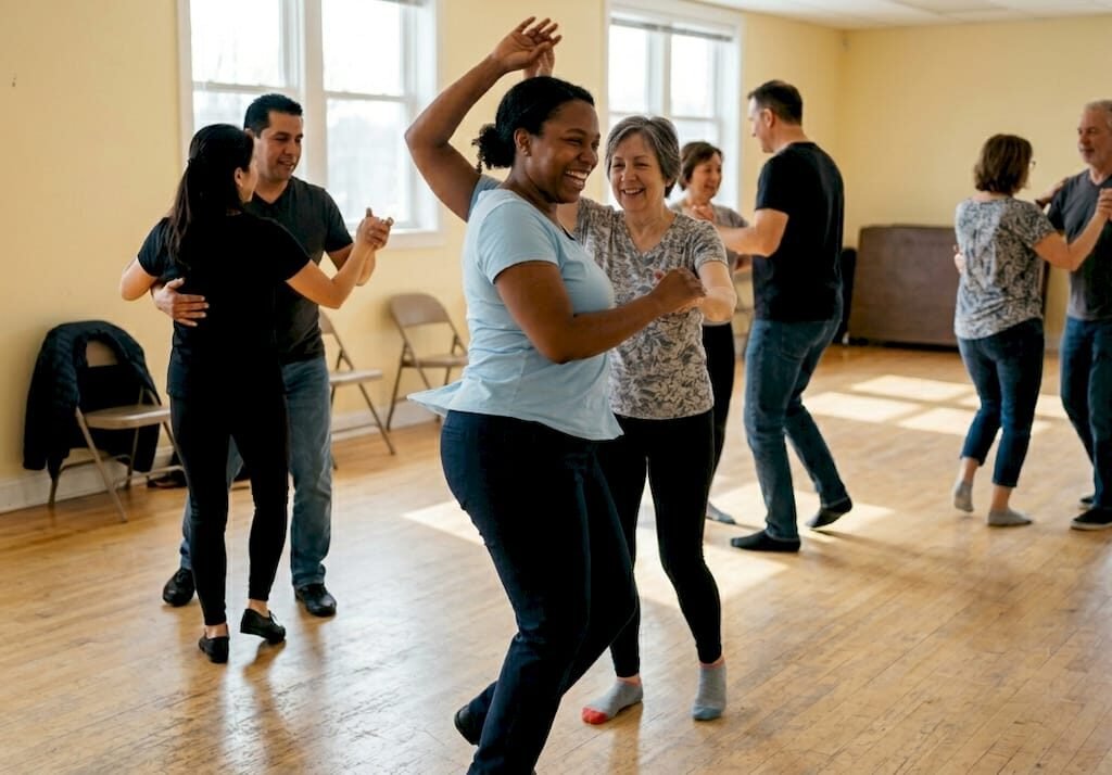 Group dancing salsa in bright community room