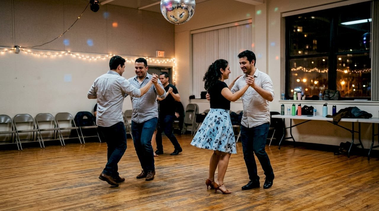 Salsa dancers at upbeat social event